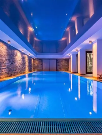 Poolcraft Ltd - Inground inside pool with chrome finishes and underwater lighting